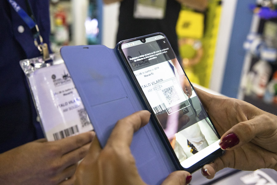 People having their smart badges scanned Smart Registration