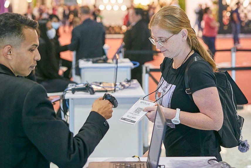 People having their smart badges scanned Smart Registration