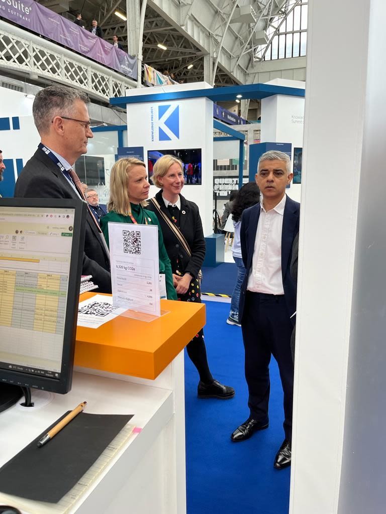 Sadiq Khan viewing a stand at London Book Fair with Helen Sheppard, RX Sustainability Director